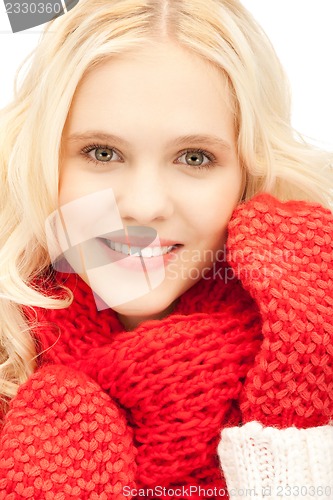 Image of beautiful woman in mittens