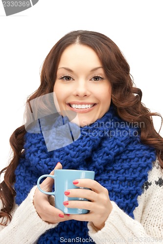 Image of woman with blue mug