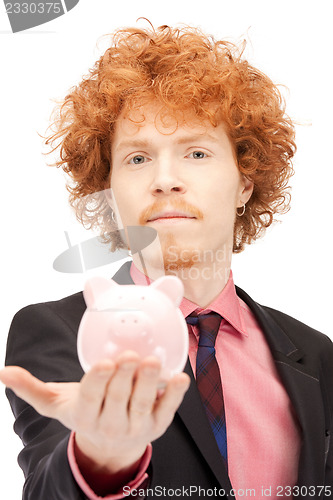 Image of man with piggy bank