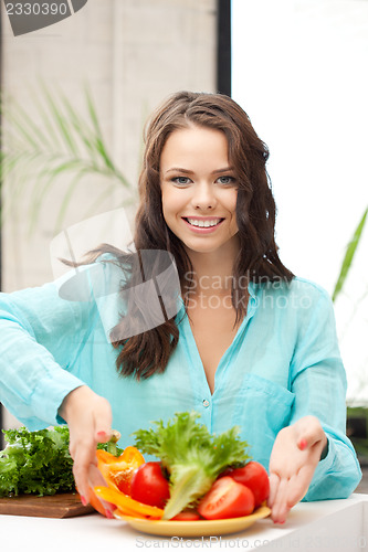 Image of beautiful woman in the kitchen