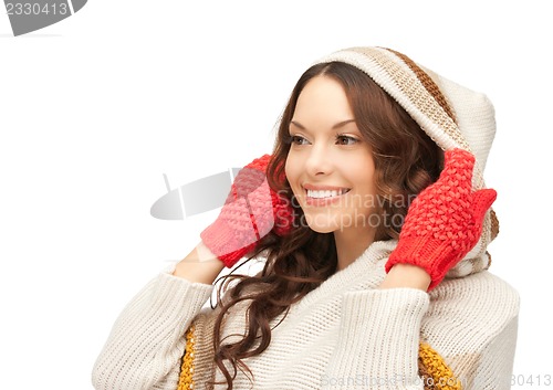 Image of beautiful woman in white sweater