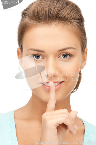 Image of finger on lips
