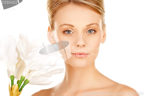 Image of beautiful woman with madonna lily