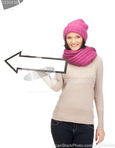 Image of woman with direction arrow sign