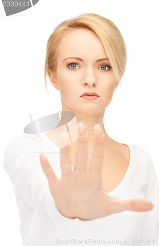 Image of woman making stop gesture