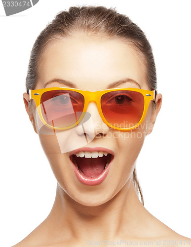 Image of happy screaming teenage girl in shades