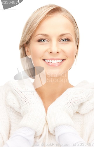 Image of beautiful woman in white sweater