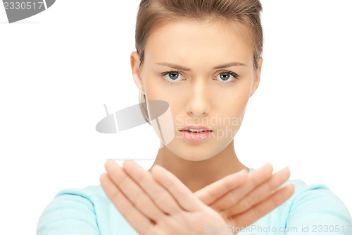 Image of woman making stop gesture