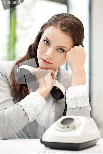Image of businesswoman with phone