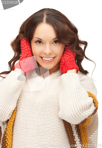 Image of beautiful woman in white sweater