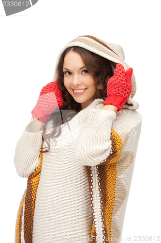 Image of beautiful woman in white sweater