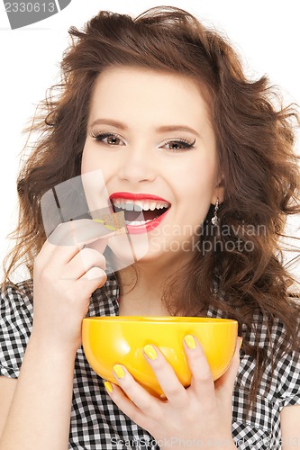Image of lovely housewife with cup