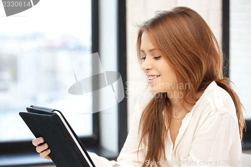 Image of happy woman with tablet pc computer