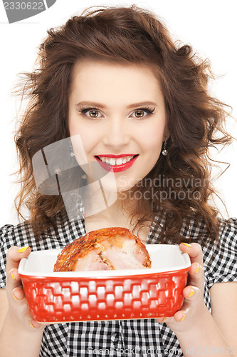 Image of lovely housewife with meat