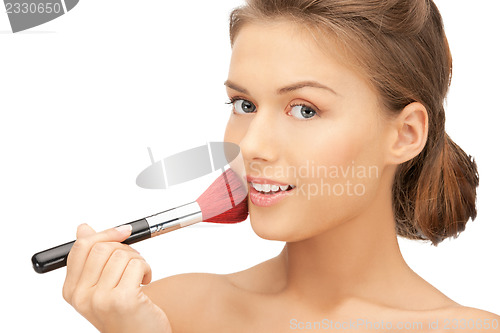 Image of beautiful woman with brush