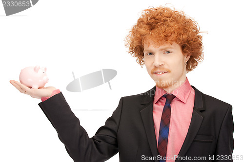 Image of man with piggy bank