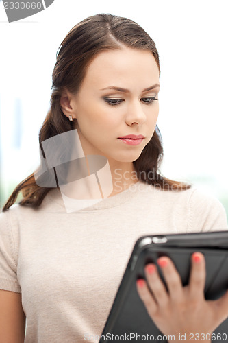 Image of calm woman with tablet pc computer