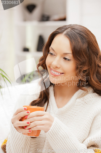 Image of lovely woman with mug