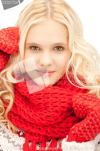 Image of beautiful woman in mittens