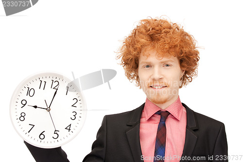 Image of man with clock