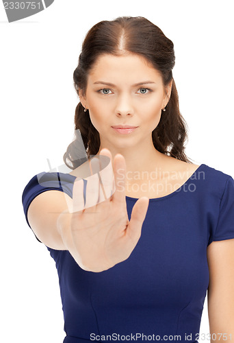 Image of woman making stop gesture