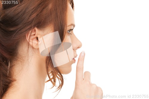 Image of finger on lips