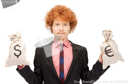 Image of man with euro and dollar bags