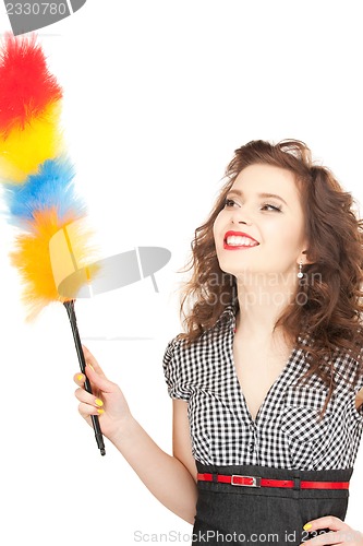 Image of beautiful woman with cleaning sweep