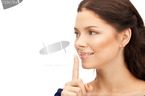 Image of finger on lips