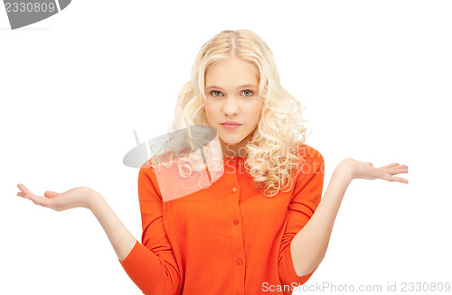 Image of woman shrugging helpless with her shoulders