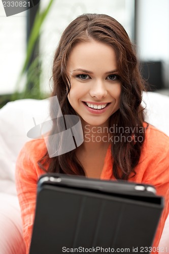 Image of happy woman with tablet pc computer