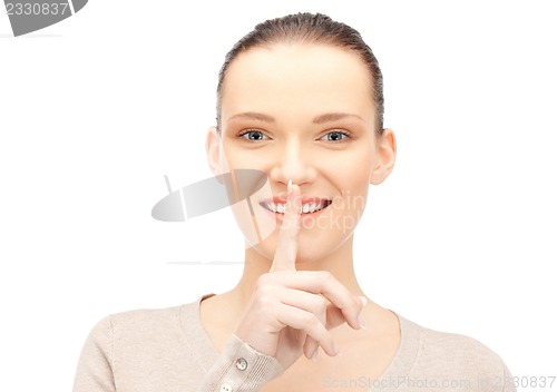 Image of finger on lips