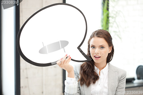 Image of smiling businesswoman with blank text bubble