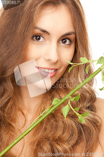 Image of woman with green sprout