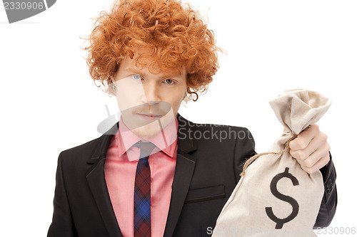 Image of man with dollar signed bag
