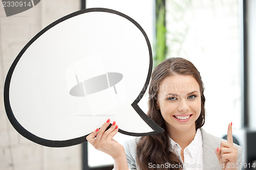 Image of smiling businesswoman with blank text bubble