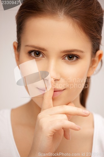 Image of finger on lips