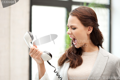 Image of businesswoman with phone