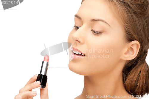 Image of beautiful woman with lipstick