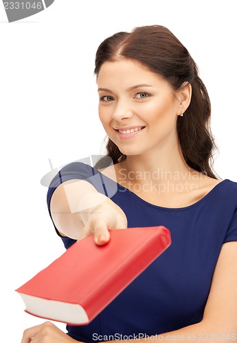 Image of happy and smiling woman with book
