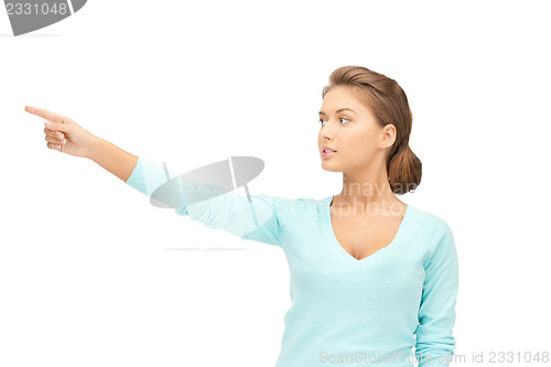 Image of businesswoman pointing her finger