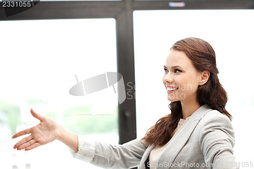 Image of woman with an open hand ready for handshake