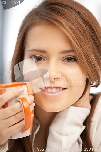 Image of lovely woman with mug