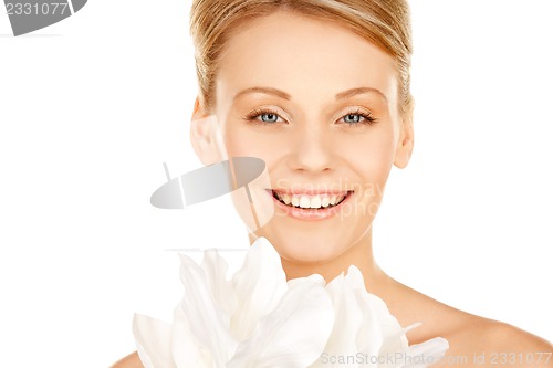 Image of beautiful woman with madonna lily