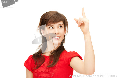 Image of teenage girl with her finger up