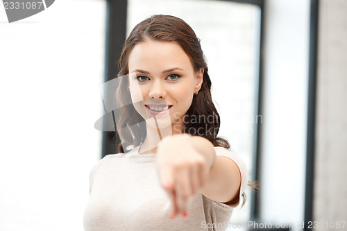 Image of businesswoman pointing her finger