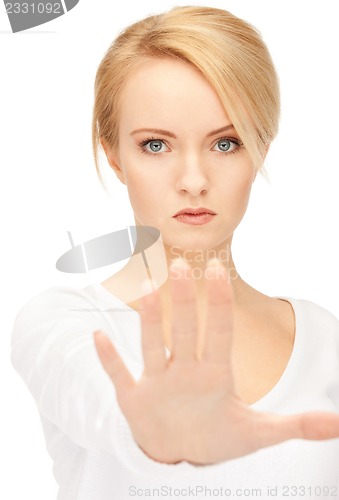 Image of woman making stop gesture