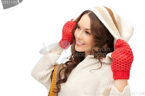 Image of beautiful woman in white sweater