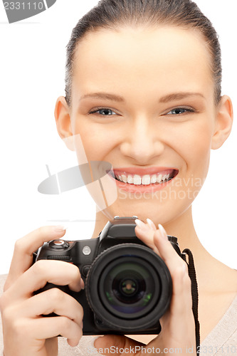 Image of teenage girl with digital camera