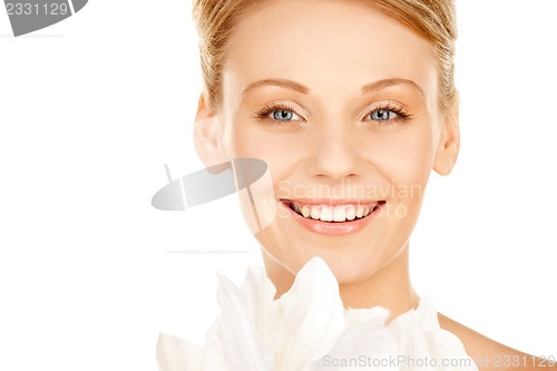 Image of beautiful woman with madonna lily